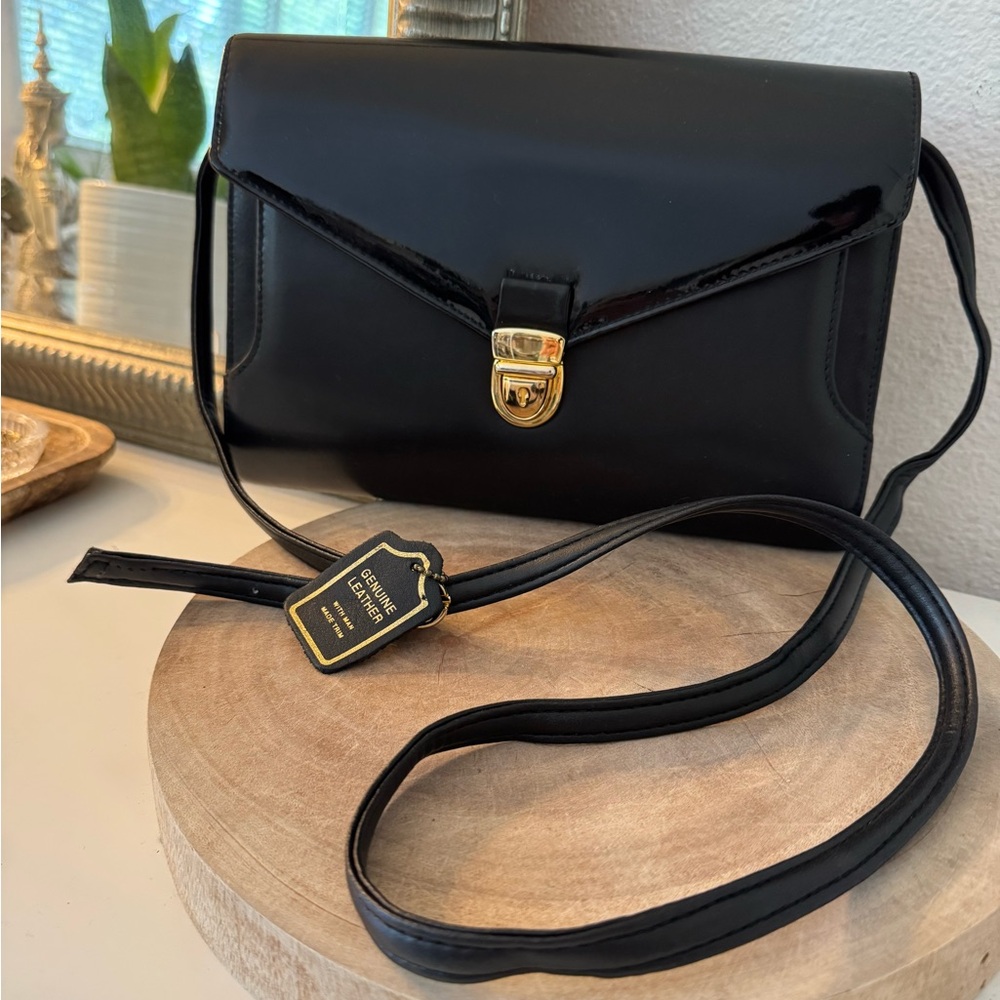 Diamicci Black and Gold Crossbody Bag with Envelope Design